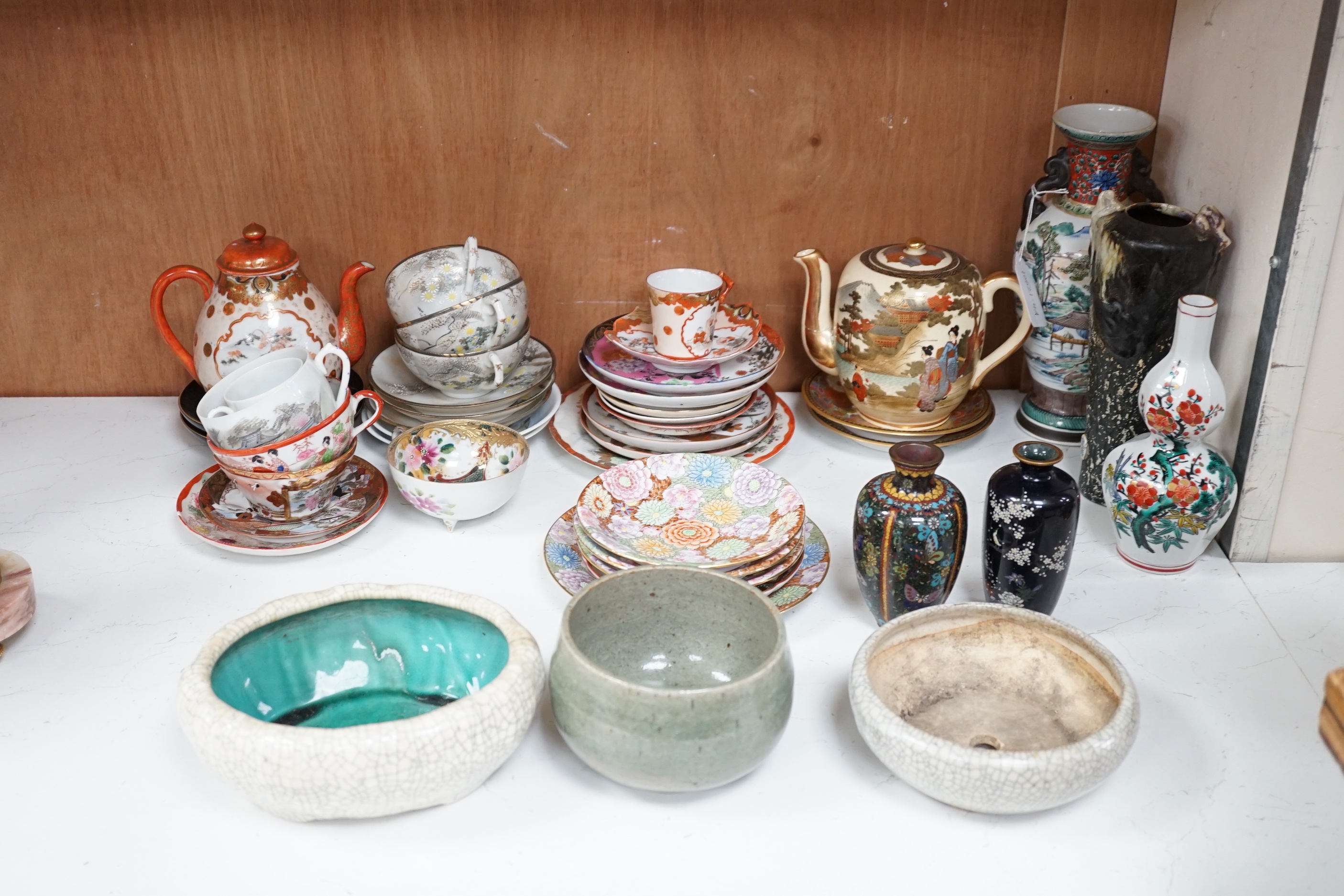 A group of various Japanese ceramics to include kutani and egg shell teawares, a Chinese crackle glaze jardiniere and another, a Chinese crackleware bowl and a blanc de chine cup